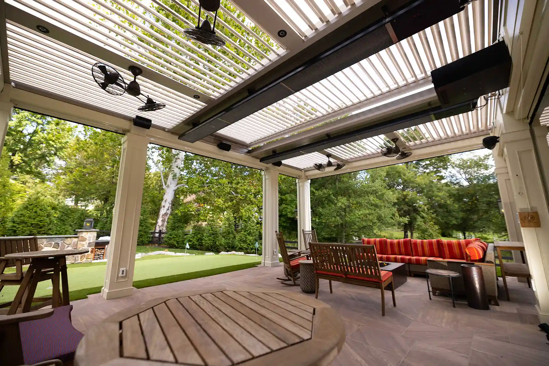 Photo of a patio with a pergola cover.